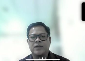 Kasubdit Pengembangan Prestasi dan Talenta Mahasiswa Unhas, Dr Suhasman saat menyampaikan sambutan dalam Sosialisasi P2MW 2025 via zoom, Jumat (14/02). Foto: Tangkapan Layar