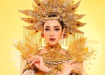 Kilau Mahkota Andi Adriana dalam Balutan Jas Putih